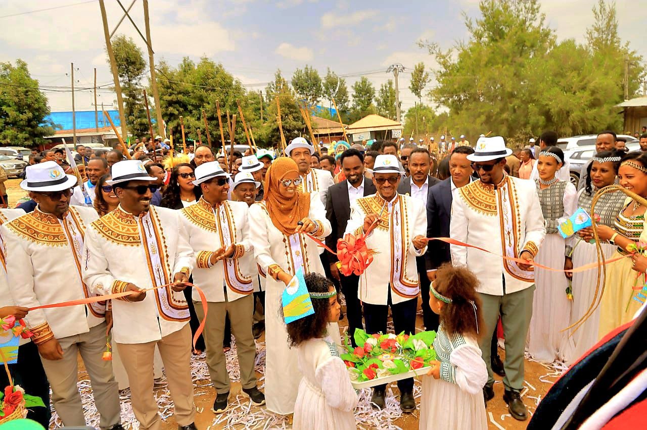 Ribbon-cutting ceremony outside Burayu Mesob.