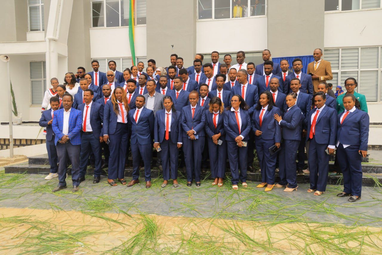 Burayu Mesob staff gathered outside the building.